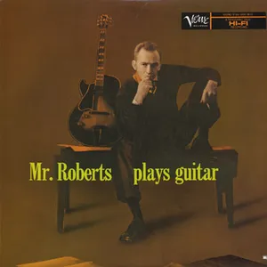 Mr. Roberts plays guitar